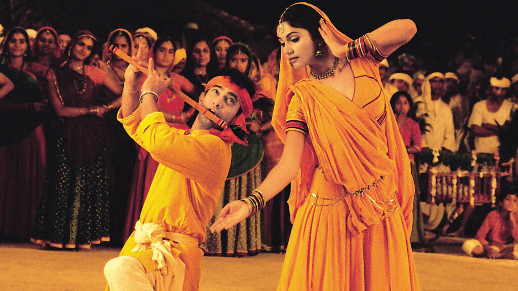 Stylized collage blending traditional Indian garments with modern streetwear, layered over musical motifs like vinyl records and sound waves. The composition visually narrates the fusion of cultural heritage and contemporary rhythm—capturing how music influences fashion across generations in India.