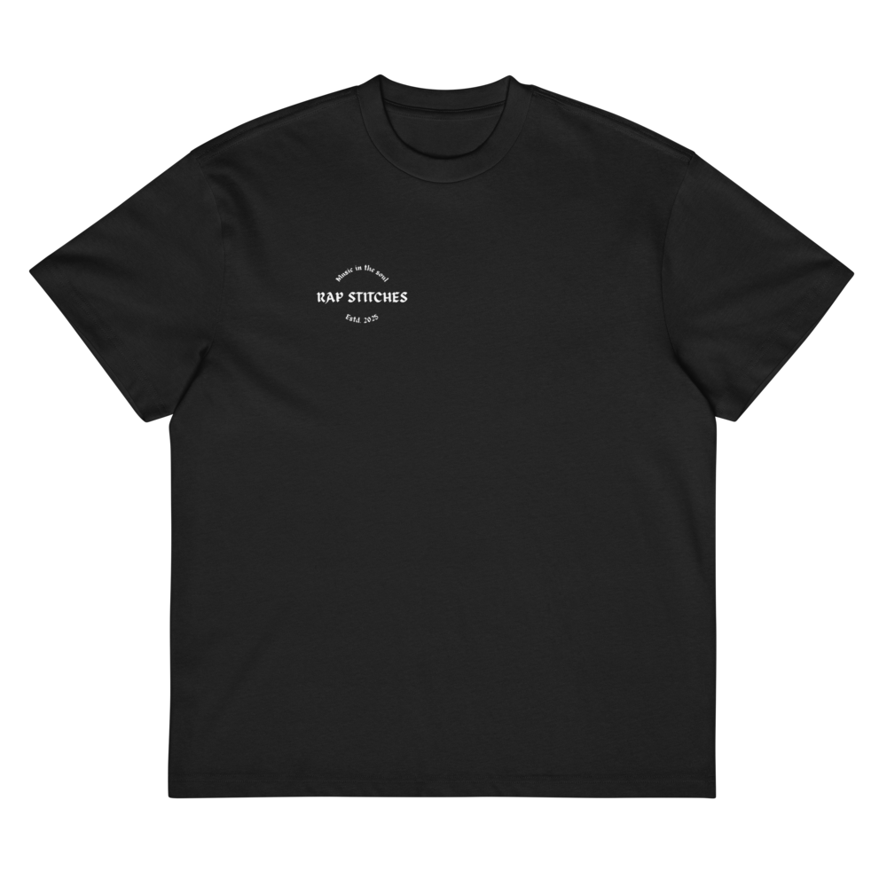 Front-facing view of a men’s box-fit t-shirt in solid black, featuring a structured silhouette, relaxed sleeves, and classic crew neckline. Set against a neutral background, the shirt’s deep tone and clean lines reflect Rap Stitches’ music-inspired streetwear—combining everyday comfort with bold, minimalist style