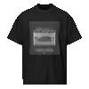 Front-facing view of a black men’s box-fit t-shirt with a structured silhouette and classic crew neckline. Set against a neutral background, the shirt’s deep tone and clean lines reflect the bold, minimalist aesthetic of the “Good Kid Maad City” collection—capturing lyrical grit and urban fashion in a sleek, wearable form.