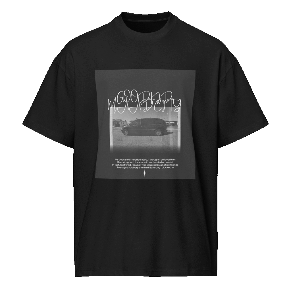Front-facing view of a black men’s box-fit t-shirt with a structured silhouette and classic crew neckline. Displayed against a neutral background, the shirt’s deep tone and clean lines reflect the bold, minimalist aesthetic of the “Good Kid Maad City” collection—translating lyrical grit and urban style into a sleek, wearable statement.