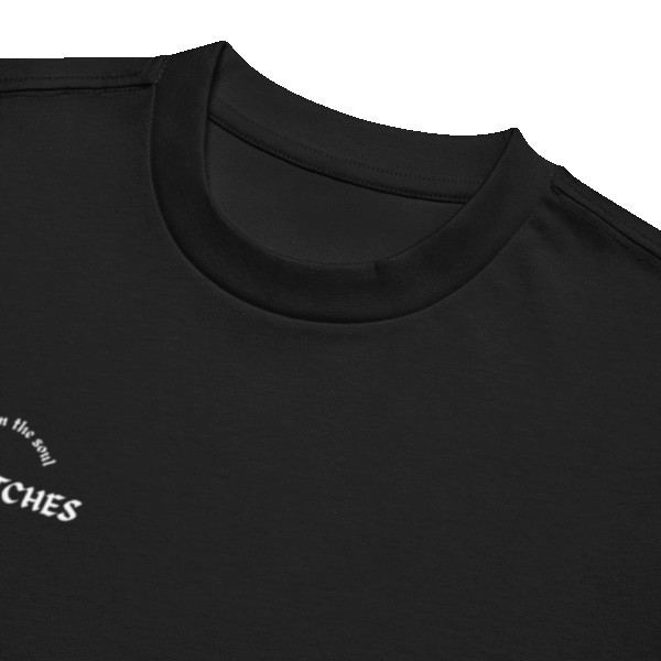 Front-facing view of a men’s box-fit t-shirt in solid black, featuring a structured silhouette, relaxed sleeves, and classic crew neckline. Set against a neutral background, the shirt’s deep tone and clean lines reflect Rap Stitches’ music-inspired streetwear—fusing everyday comfort with bold, minimalist style.