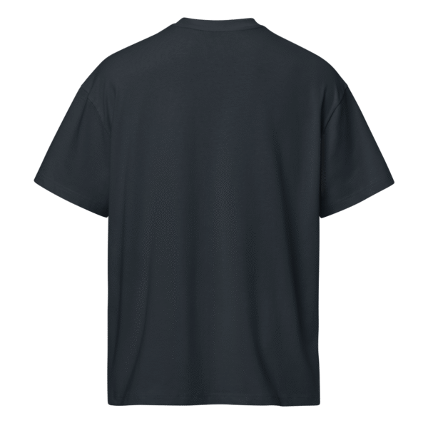 Back view of a navy blue men’s box-fit t-shirt with a structured silhouette and clean hemline. Set against a neutral background, the shirt’s bold color and minimalist design reflect the confident, streetwear-inspired aesthetic of the Designer Travis Scott series—fusing music culture with urban fashion.