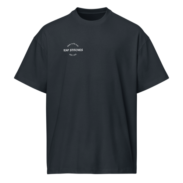 Front-facing view of a men’s box-fit t-shirt in navy blue, featuring a structured silhouette, relaxed sleeves, and classic crew neckline. Set against a neutral background, the shirt’s deep tone and minimalist design reflect Rap Stitches’ music-inspired streetwear—merging everyday comfort with bold, understated style.