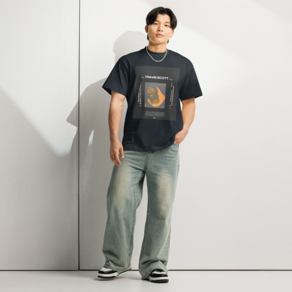 Front-facing view of a navy blue men’s box-fit t-shirt with a structured silhouette and classic crew neckline. Displayed against a neutral background, the shirt’s bold color and clean lines reflect the confident, minimalist aesthetic of the Designer Travis Scott series—fusing urban fashion with music-inspired design.