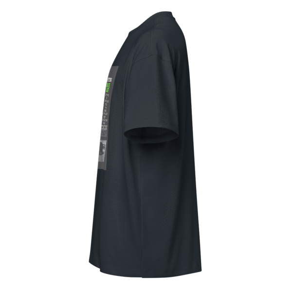 Left-side view of a navy blue men’s box-fit t-shirt with a structured silhouette and classic crew neckline. Set against a neutral background, the shirt’s bold color and clean lines reflect the confident, minimalist aesthetic of the Designer Travis Scott series—blending urban fashion with music-inspired design.
