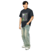 Left-front angled view of a navy blue men’s box-fit t-shirt with a structured silhouette and classic crew neckline. Set against a neutral background, the shirt’s bold color and clean lines reflect the confident, minimalist aesthetic of the Designer Travis Scott series—fusing urban fashion with music-inspired design.