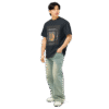 Left-front angled view of a navy blue men’s box-fit t-shirt with a structured silhouette and classic crew neckline. Displayed against a neutral background, the shirt’s bold color and clean lines reflect the confident, minimalist aesthetic of the Designer Travis Scott series—blending urban fashion with music-inspired design.