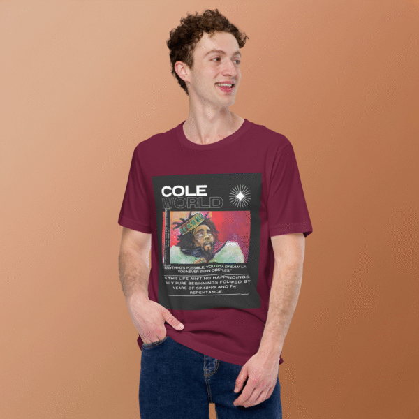 Front-facing view of a maroon unisex staple t-shirt with a relaxed fit and classic crew neckline. Displayed against a neutral background, the shirt’s smooth texture and deep color reflect the introspective, minimalist aesthetic of the Cole World designer series—blending lyrical storytelling with everyday streetwear appeal