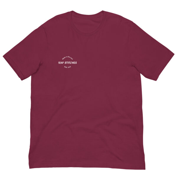 Front-facing view of a unisex maroon staple t-shirt with a structured silhouette and classic crew neckline. Set against a neutral background, the shirt’s rich color and minimalist design reflect Rap Stitches’ music-inspired streetwear—blending everyday comfort with bold, understated style.