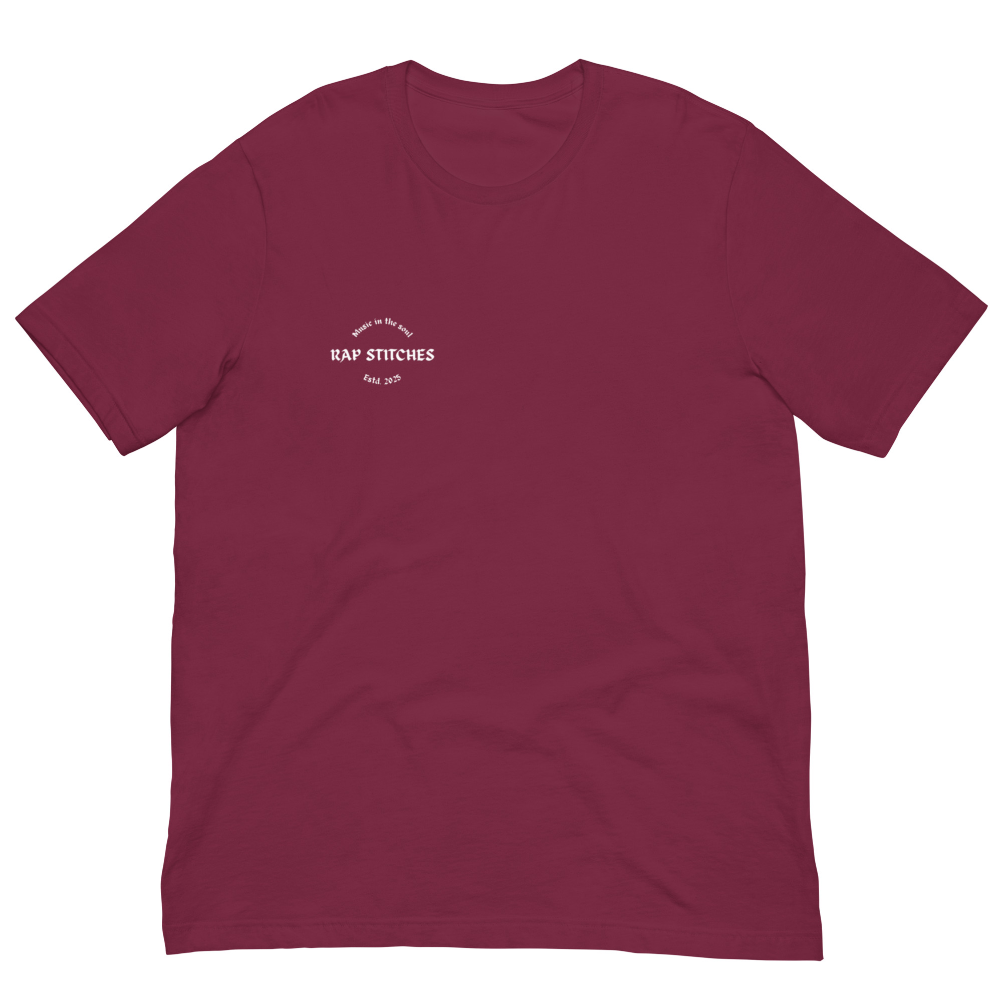 Front-facing view of a unisex maroon staple t-shirt with a structured silhouette and classic crew neckline. Set against a neutral background, the shirt’s rich color and minimalist design reflect Rap Stitches’ music-inspired streetwear—blending everyday comfort with bold, understated style.