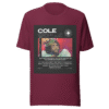 Front-facing view of a maroon unisex staple t-shirt with a relaxed fit and classic crew neckline. Set against a neutral background, the shirt’s smooth texture and rich color reflect the understated, introspective vibe of the Cole World designer series—merging lyrical depth with everyday streetwear appeal.