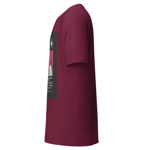 Left-angled front view of a maroon unisex staple t-shirt with a soft, structured fit and classic crew neckline. Displayed against a neutral background, the shirt’s minimalist design and rich color evoke the introspective, lyrical tone of the Cole World collection—blending streetwear edge with everyday versatility.