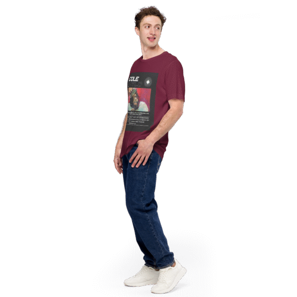Front-left angled view of a maroon unisex staple t-shirt with a soft, structured fit and classic crew neckline. Set against a neutral background, the shirt’s clean lines and rich color highlight its versatile, streetwear-inspired aesthetic—designed for the Cole World collection.